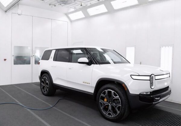 Rivian sitting in paint booth-Rivian certified collision repair Bstreet collision